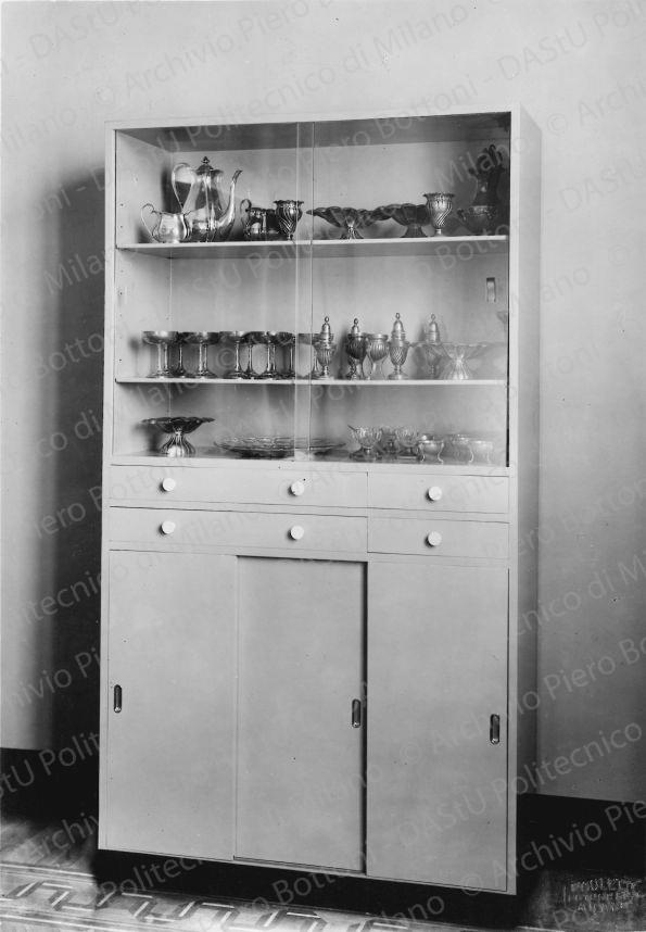 Veduta della credenza. Timbro a secco "Paoletti fotografo Milano". Positivo, bianco e nero, 218x150 mm, album giallo n.8, pag.45.