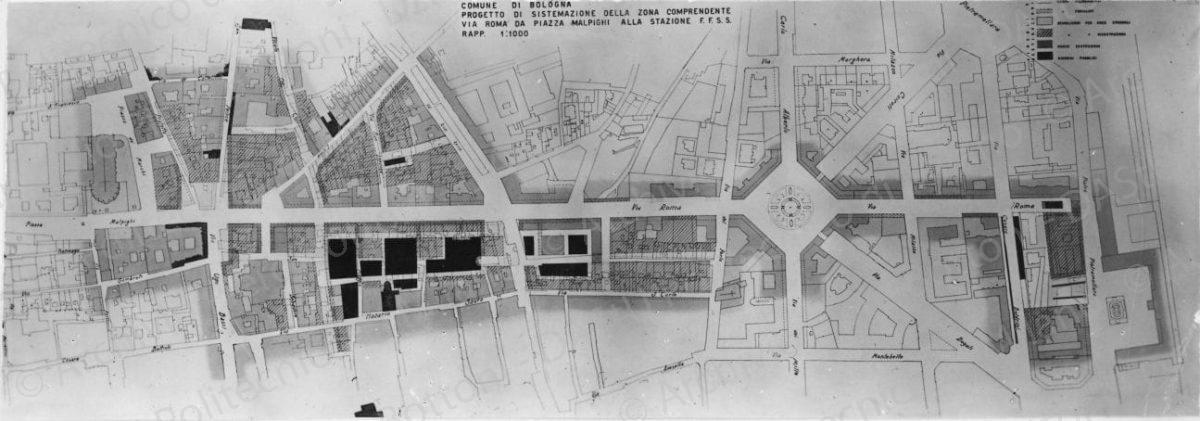 Riproduzione di tavola: "Studio della nuova arteria sussidiaria all'asse via Rizzoli - via Ugo Bassi - via S. Felice interessante la sistemazione di via Roma 1:1000", planimetria. Positivo, bianco e nero, 73x205 mm, album giallo n.3, pag.24.